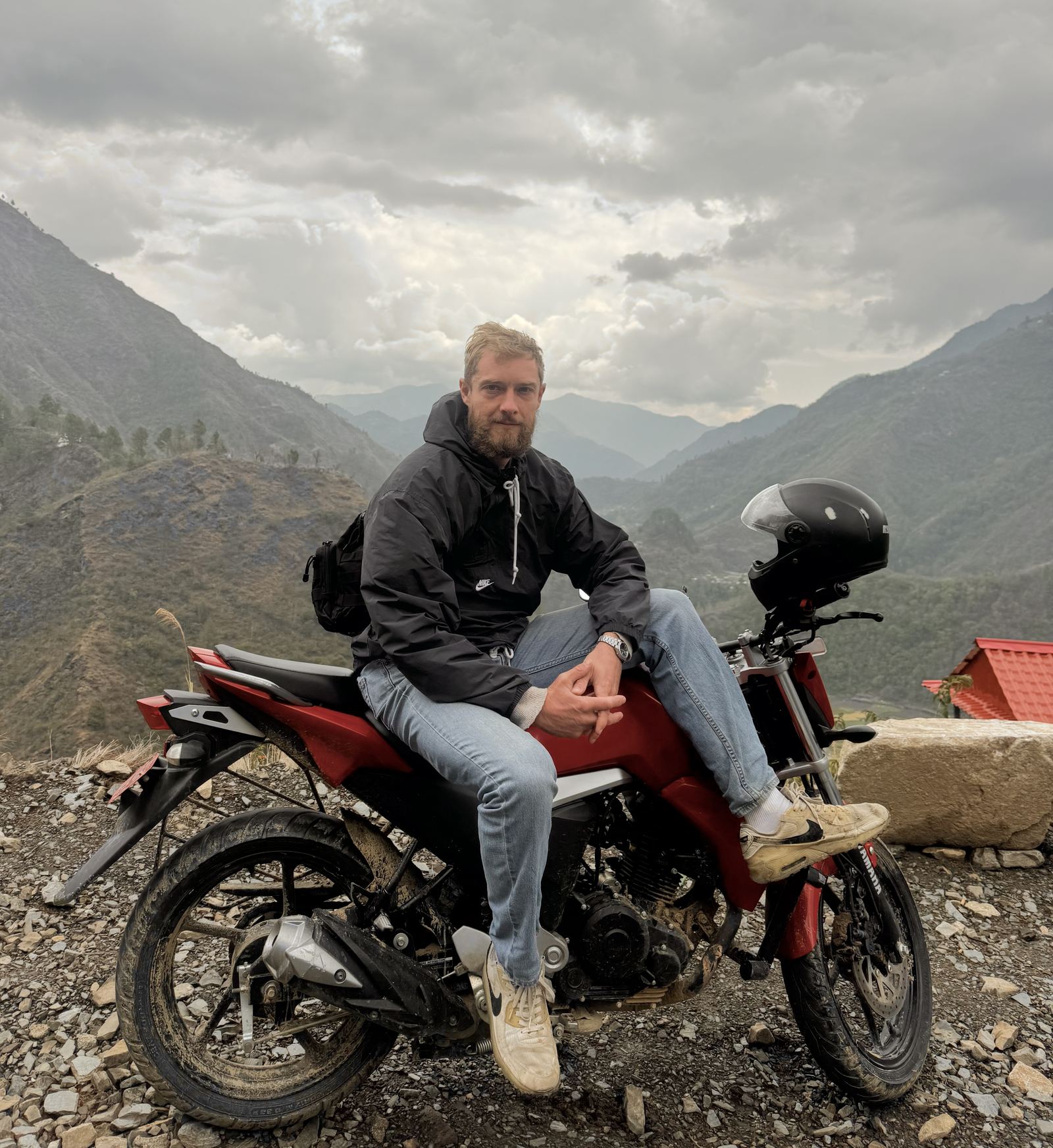Jack on a motorbike in the mountains of Nepal.